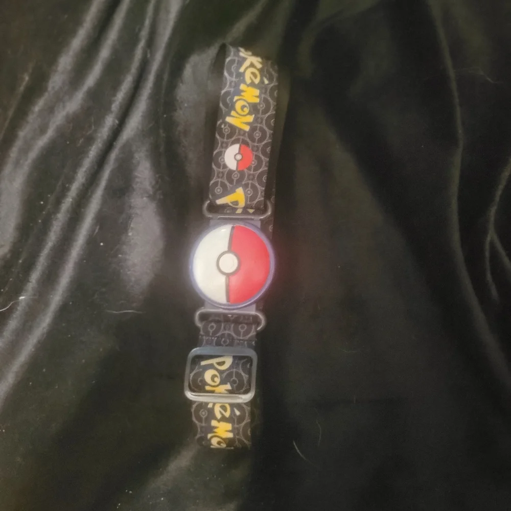 Red and Black Watch with Intricate Bead Design